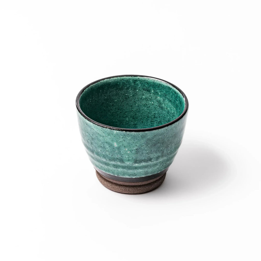 Turkish blue Japanese ceramic sake cup with rustic brown base and textured glaze, ideal for enjoying traditional sake