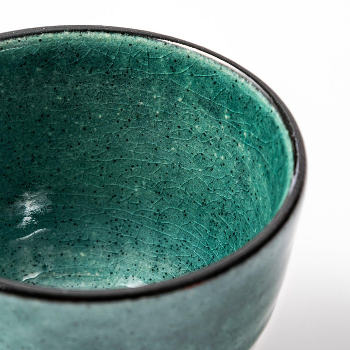 Turkish blue Japanese ceramic sake cup with rustic brown base and textured glaze, ideal for enjoying traditional sake