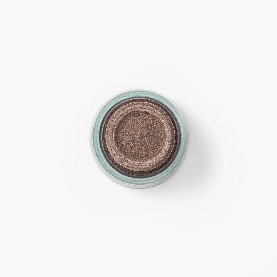 Turkish blue Japanese ceramic sake cup with rustic brown base and textured glaze, ideal for enjoying traditional sake