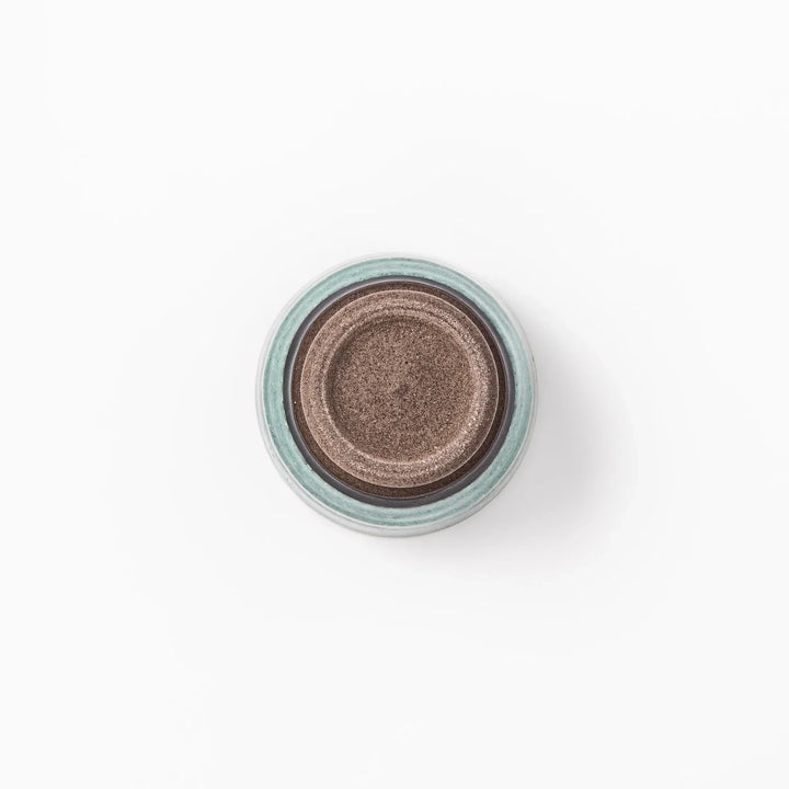 Turkish blue Japanese ceramic sake cup with rustic brown base and textured glaze, ideal for enjoying traditional sake