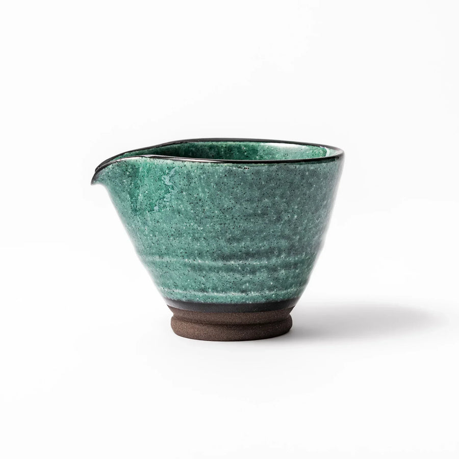 Turkish blue Japanese ceramic sake pourer with rustic earthy base and textured glaze, perfect for traditional sake serving