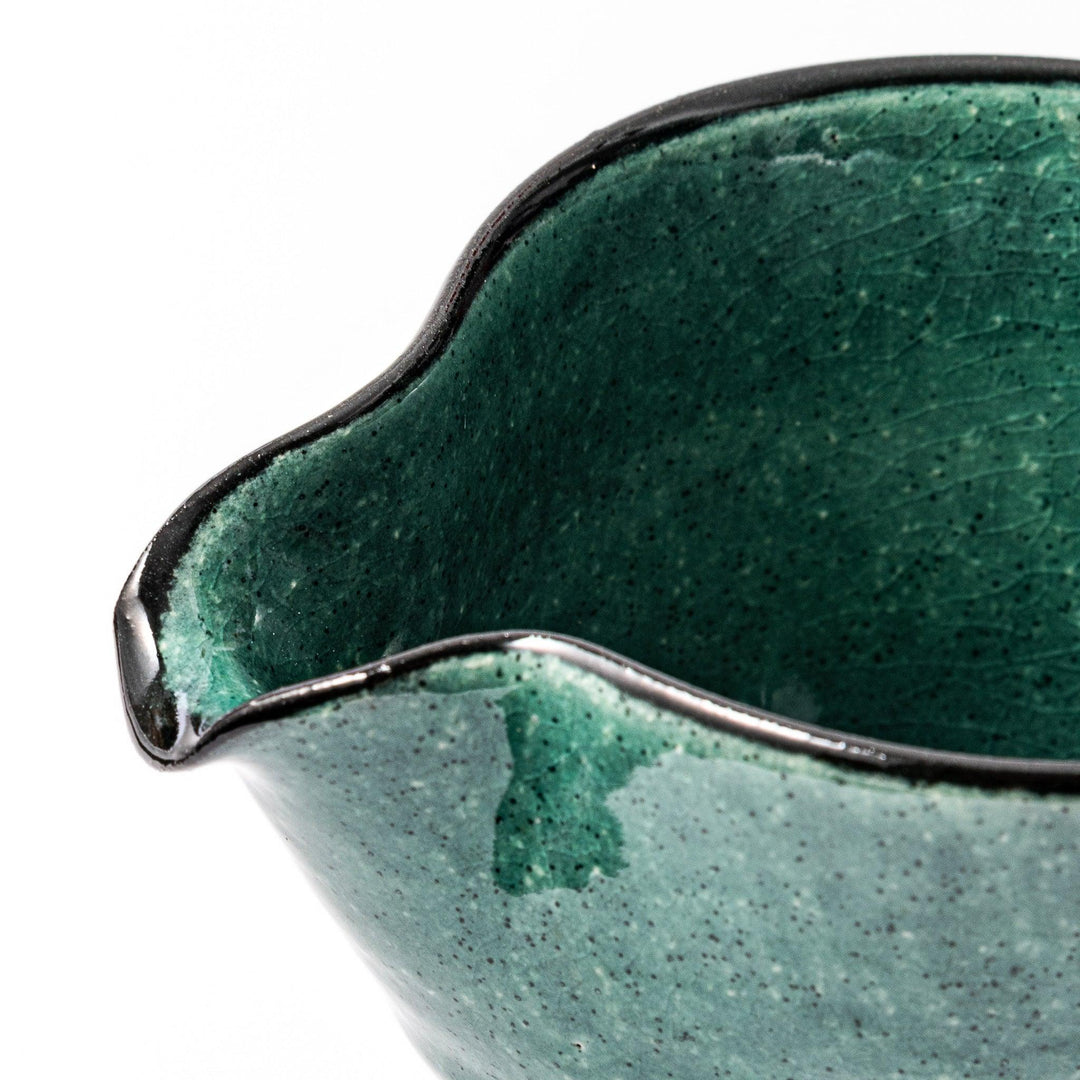 Turkish blue Japanese ceramic sake pourer with rustic earthy base and textured glaze, perfect for traditional sake serving