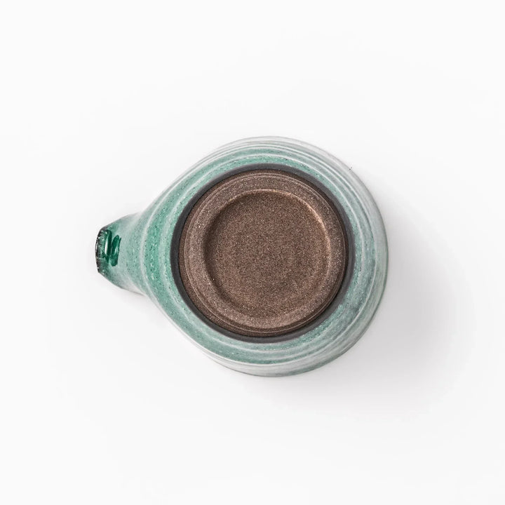 Turkish blue Japanese ceramic sake pourer with rustic earthy base and textured glaze, perfect for traditional sake serving