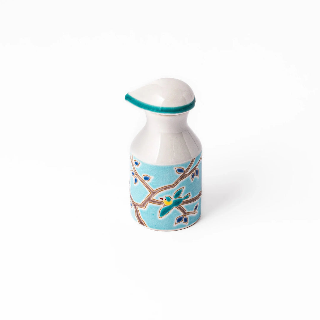 Japanese ceramic soy sauce dispenser with a turquoise lid and bird and branch motif, beautifully handcrafted in Arita Japan.