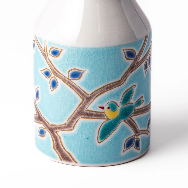 Japanese ceramic soy sauce dispenser with a turquoise lid and bird and branch motif, beautifully handcrafted in Arita Japan.