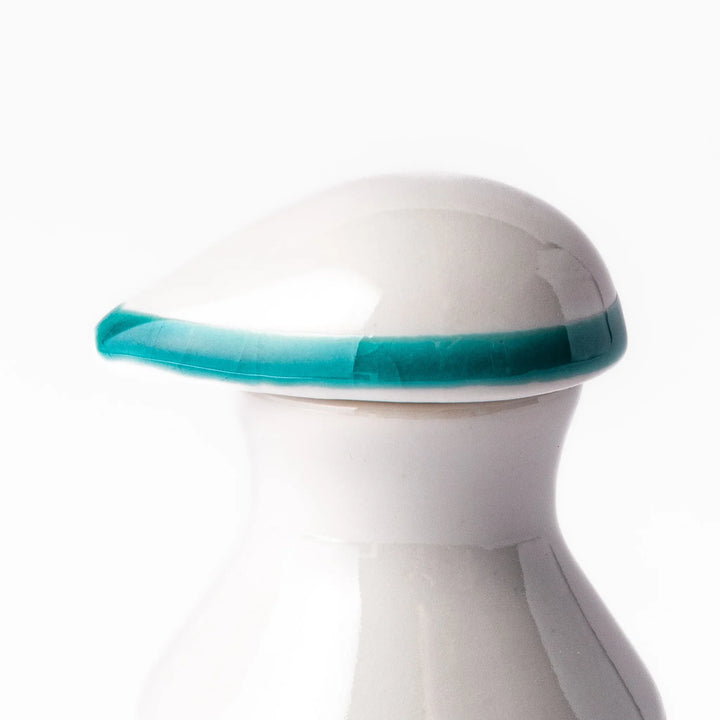 Japanese ceramic soy sauce dispenser with a turquoise lid and bird and branch motif, beautifully handcrafted in Arita Japan.