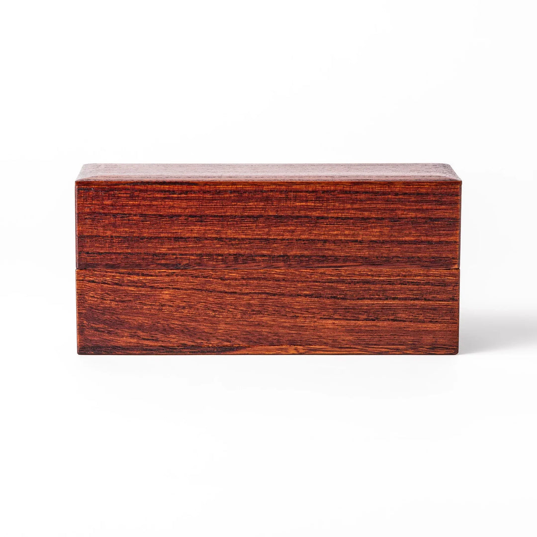 Rectangular Japanese two tier bento box made of dark brown paulownia wood with sleek minimalist design.