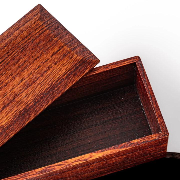 Rectangular Japanese two tier bento box made of dark brown paulownia wood with sleek minimalist design.