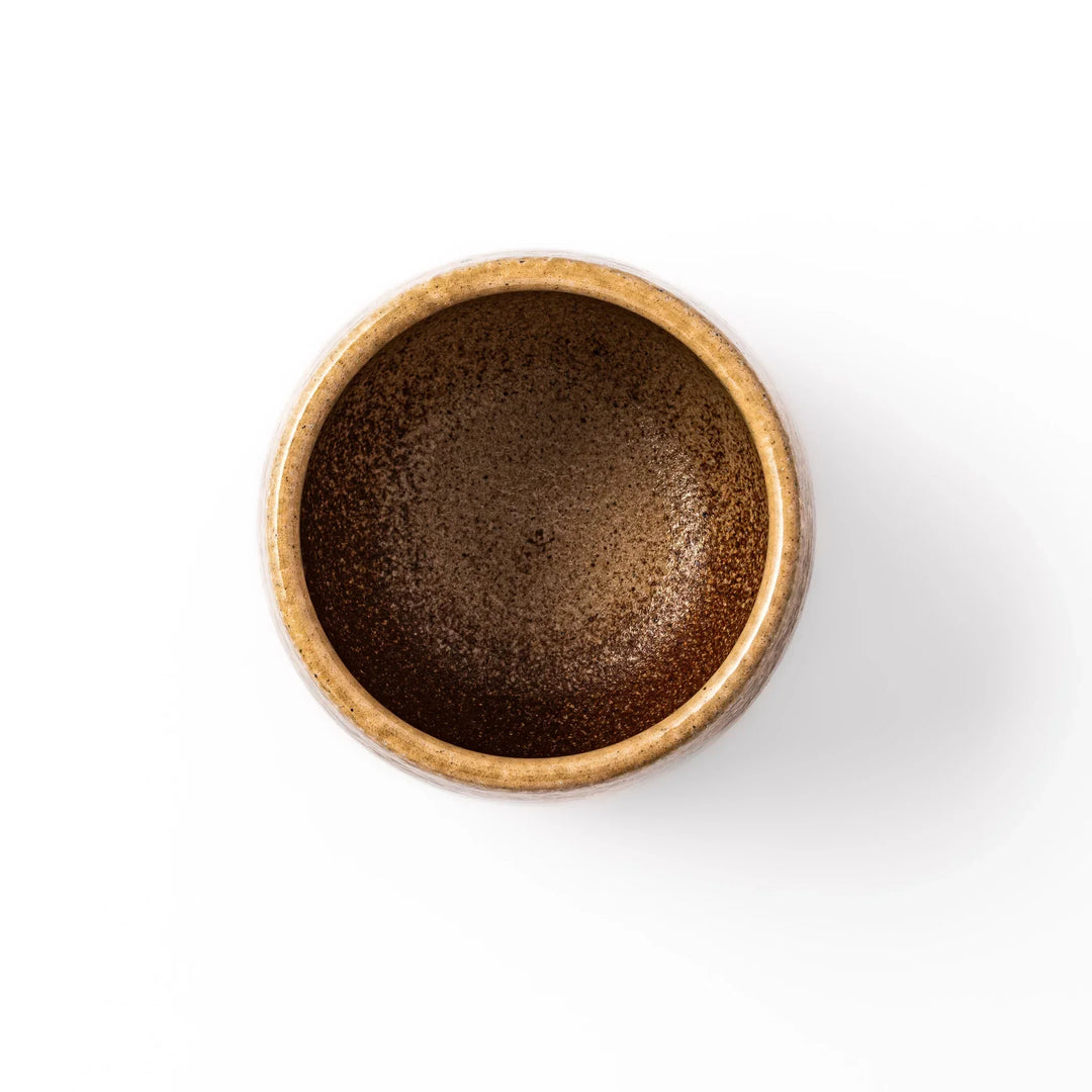 Two tone Japanese ceramic rice storage bowl with lid glazed top and textured brown base for rustic charm.