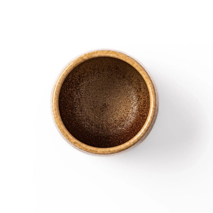 Two tone Japanese ceramic rice storage bowl with lid glazed top and textured brown base for rustic charm.