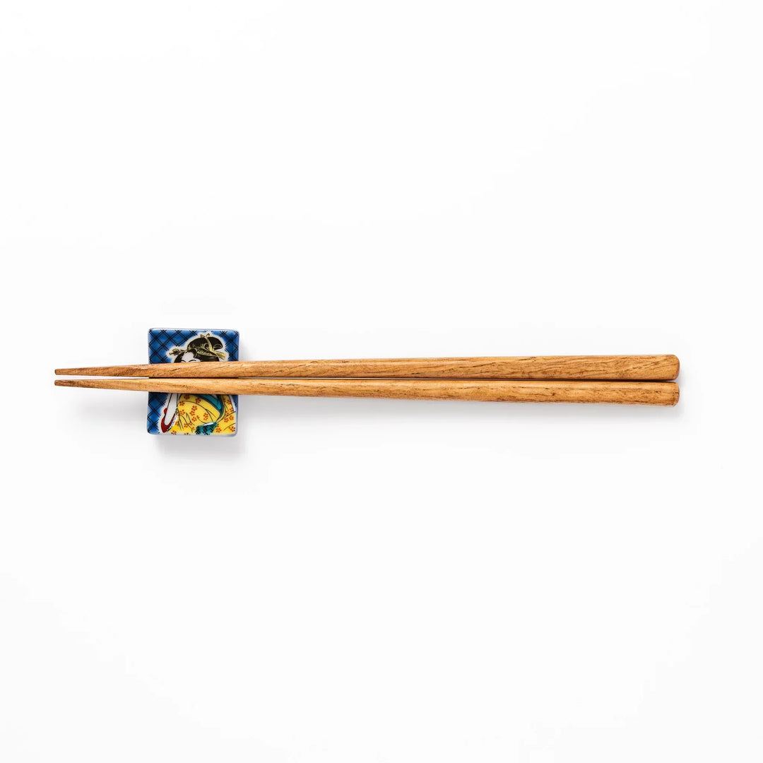 Rectangular Japanese ceramic chopstick rest with courtesan design inspired by Utamaro ukiyoe artistry.