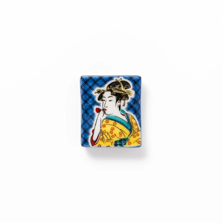 Rectangular Japanese ceramic chopstick rest with courtesan design inspired by Utamaro ukiyoe artistry.