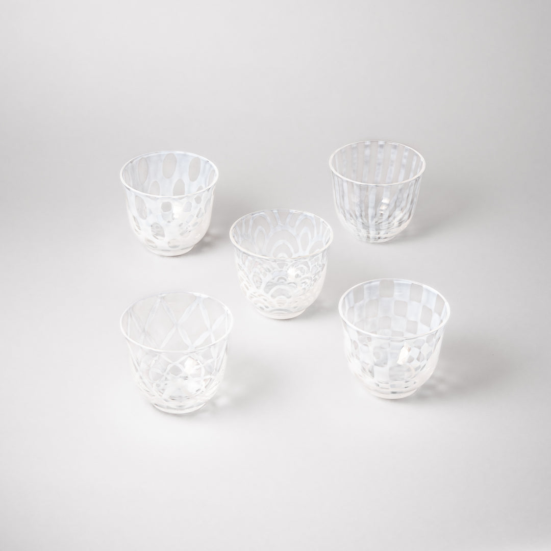 Vintage Japanese glass tea cup set with five unique patterns including stripe lattice polka dot and wave clear textured tumblers