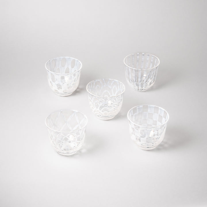 Vintage Japanese glass tea cup set with five unique patterns including stripe lattice polka dot and wave clear textured tumblers
