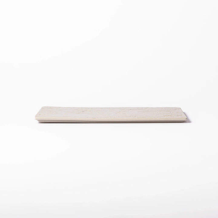 White Japanese ceramic dinner plate with subtle woodgrain texture for elegant minimalist table settings.