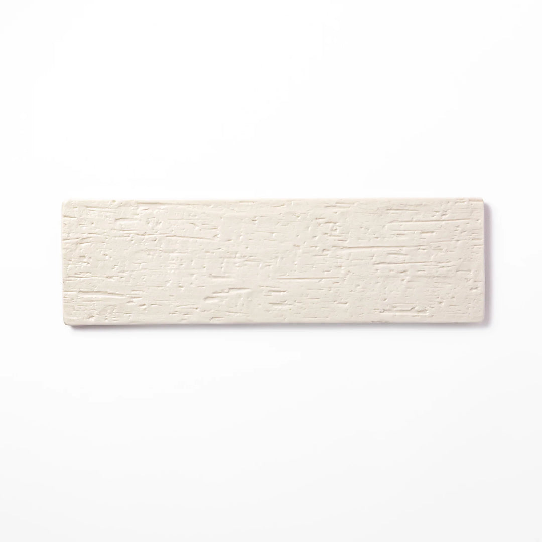 Rectangular white Japanese ceramic serving plate with woodgrain pattern for minimalist modern table setting.