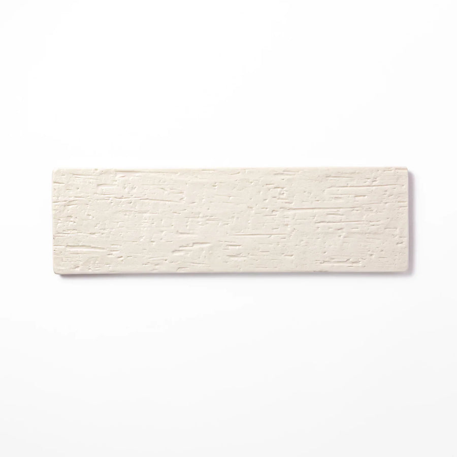 Rectangular white Japanese ceramic serving plate with woodgrain pattern for minimalist modern table setting.