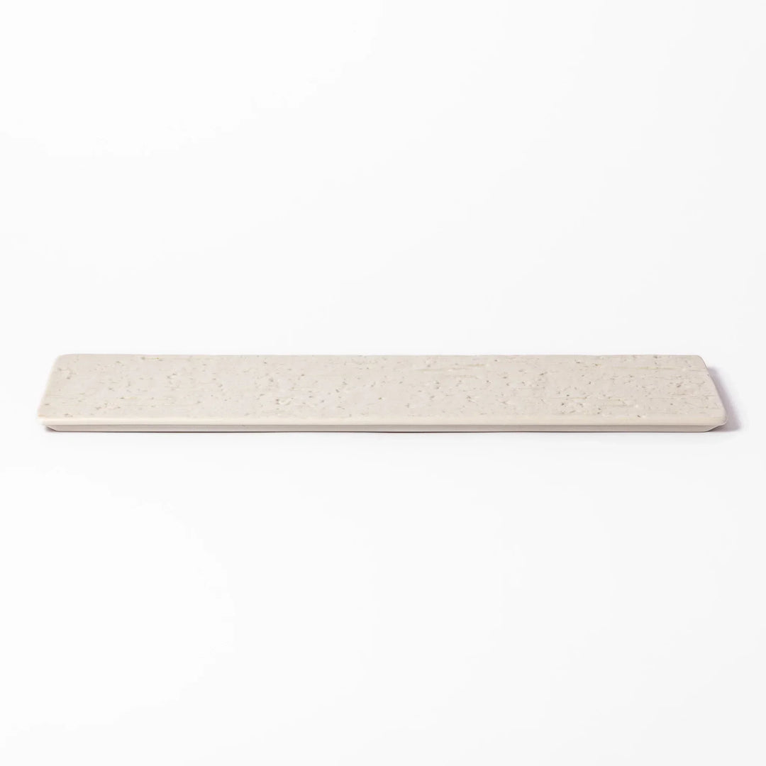 Rectangular white Japanese ceramic serving plate with woodgrain pattern for minimalist modern table setting.