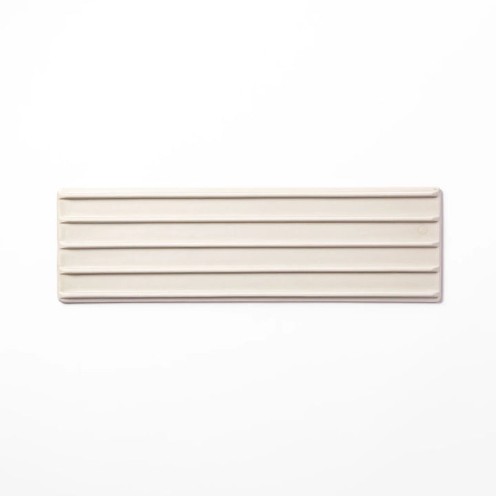 Rectangular white Japanese ceramic serving plate with woodgrain pattern for minimalist modern table setting.