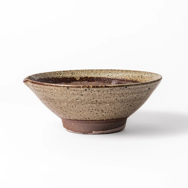 Speckled white Karatsu-style mortar with a deep brown interior and textured ridges, ideal for traditional sesame grinding.