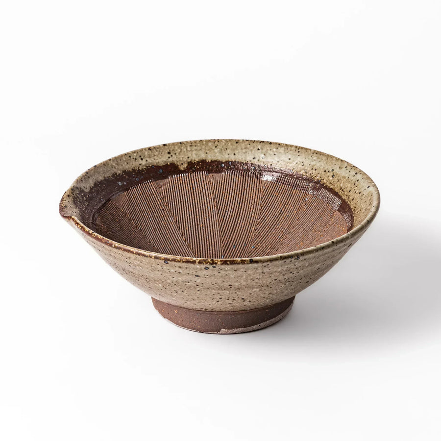 Speckled white Karatsu-style mortar with a deep brown interior and textured ridges, ideal for traditional sesame grinding.