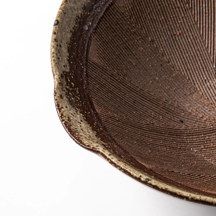 Speckled white Karatsu-style mortar with a deep brown interior and textured ridges, ideal for traditional sesame grinding.