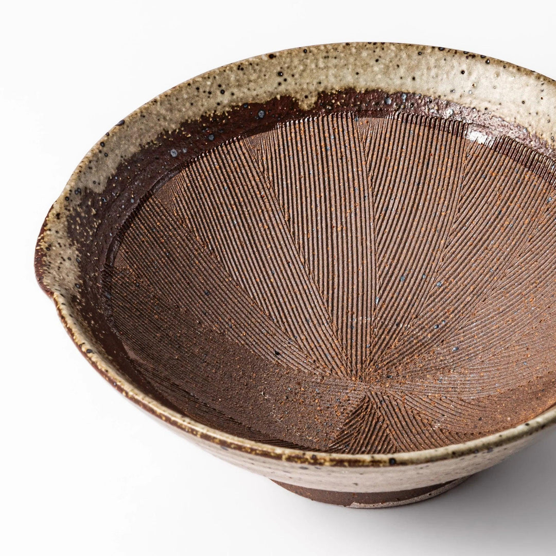 Speckled white Karatsu-style mortar with a deep brown interior and textured ridges, ideal for traditional sesame grinding.