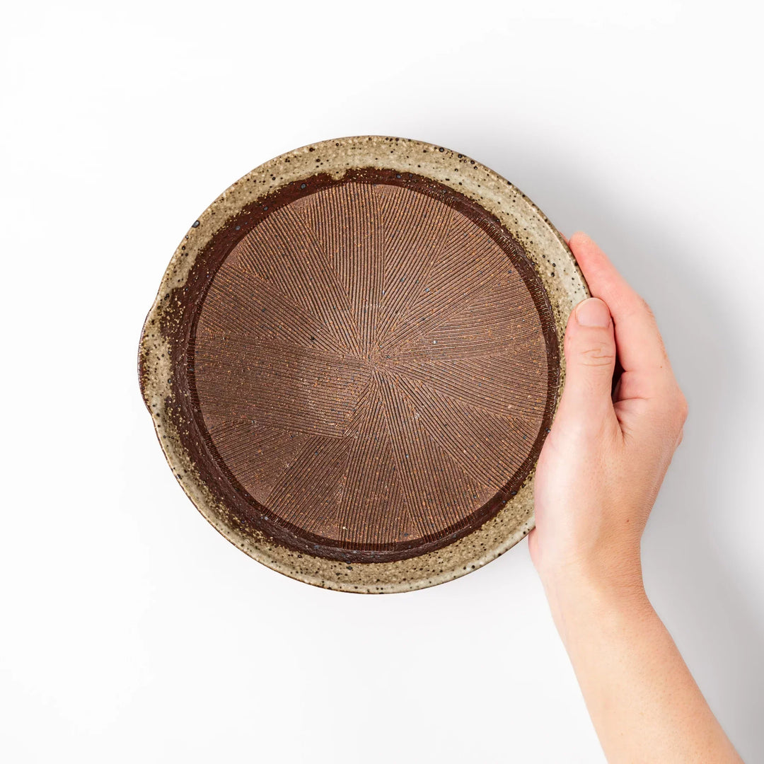 Speckled white Karatsu-style mortar with a deep brown interior and textured ridges, ideal for traditional sesame grinding.