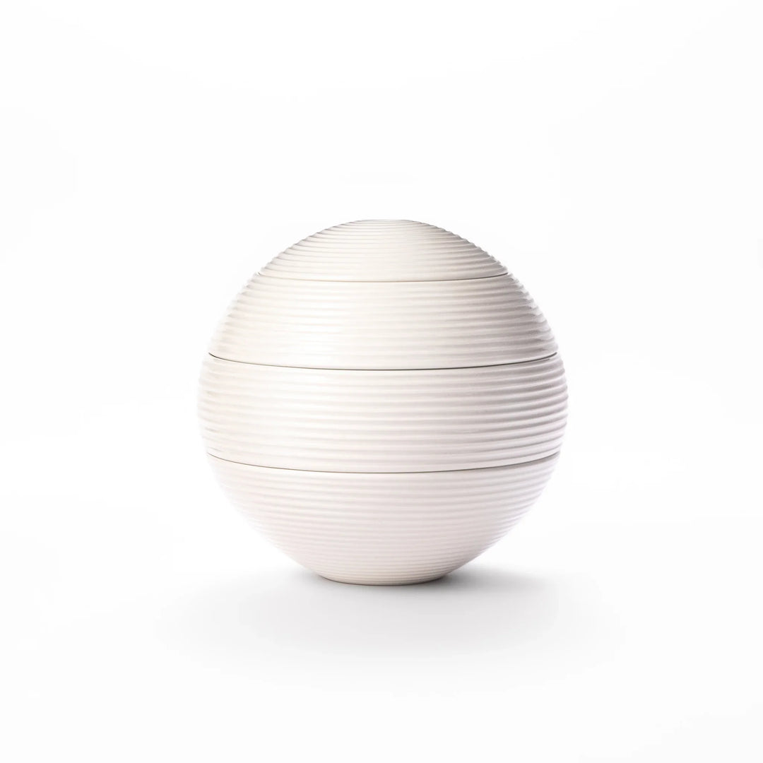 White porcelain moon shaped jubako box with textured ridged surface