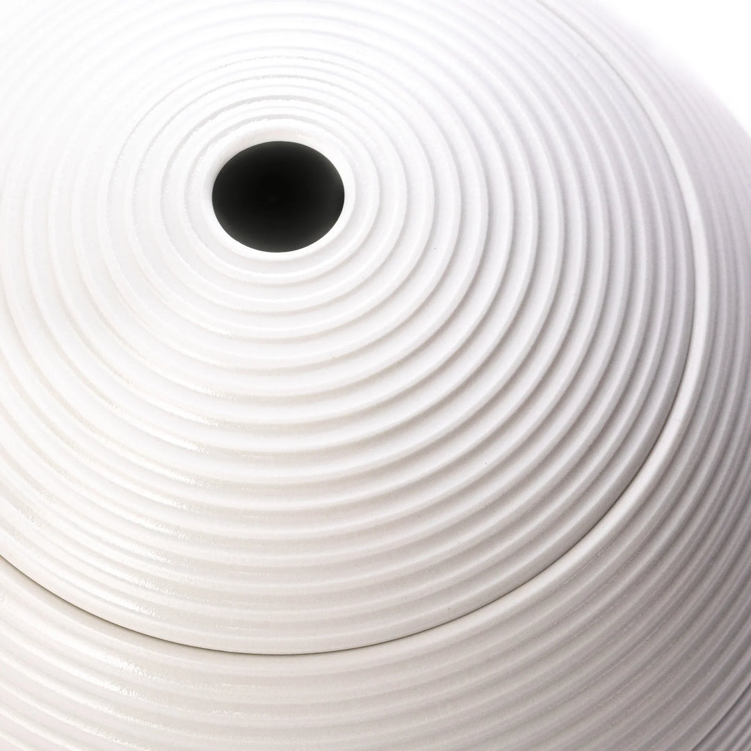 White porcelain moon shaped jubako box with textured ridged surface