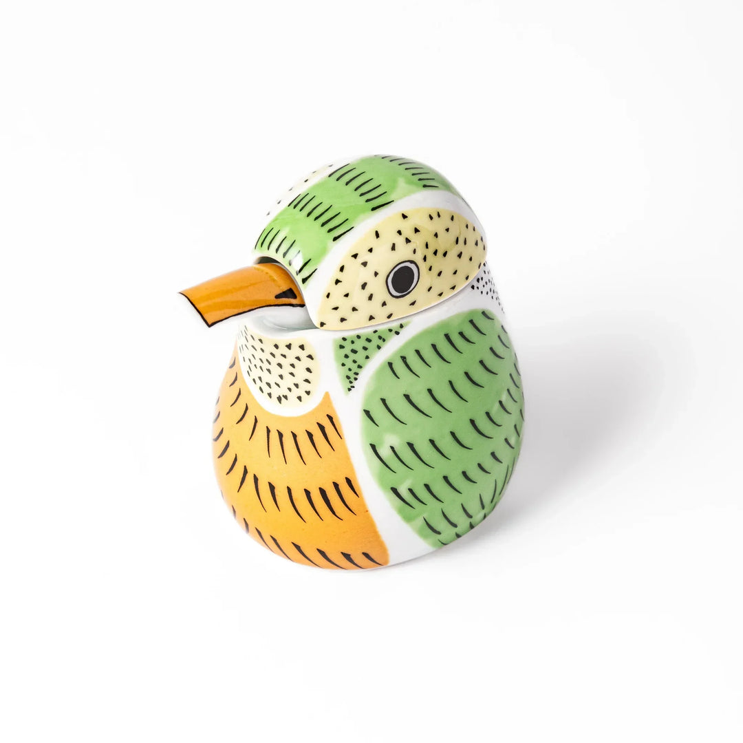 Bird-shaped soy sauce dispenser with green and yellow hand-painted details, adding a playful touch to your table.