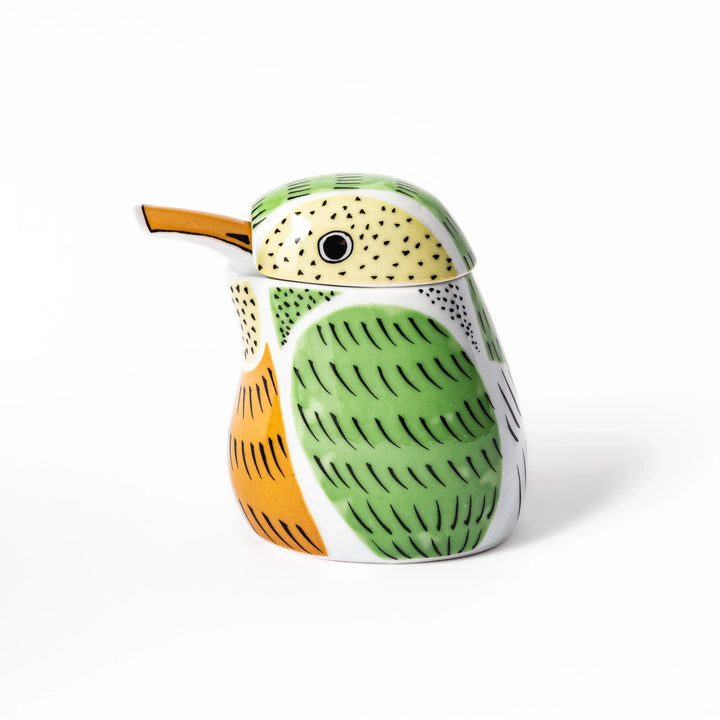 Bird-shaped soy sauce dispenser with green and yellow hand-painted details, adding a playful touch to your table.