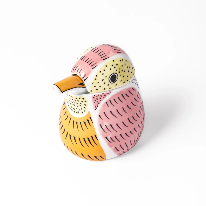 Bird-shaped soy sauce dispenser with pink and yellow hand-painted details, adding a playful touch to your table.