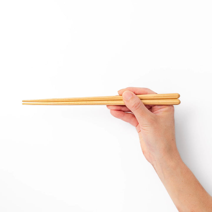 Japanese Hinoki wood chopsticks with smooth natural grain, lightweight design for everyday dining and traditional meals.