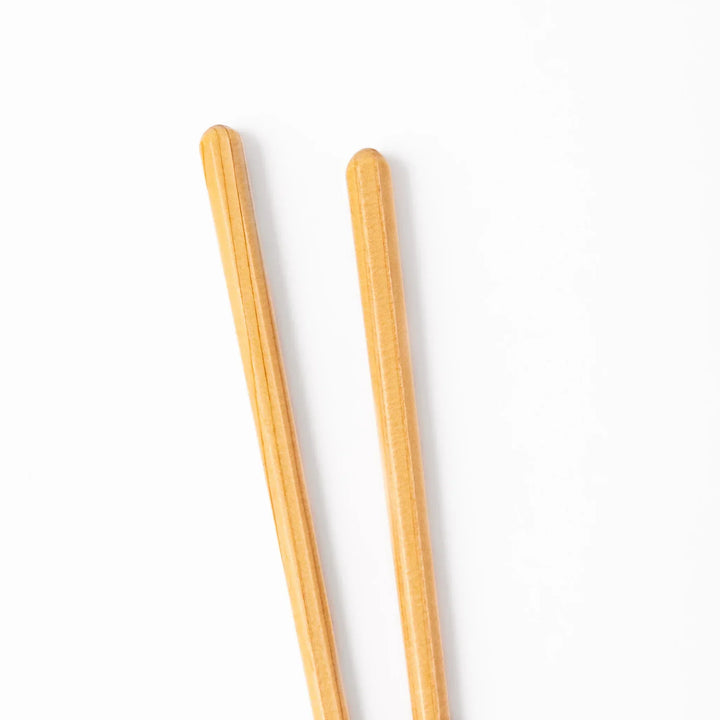 Japanese Hinoki wood chopsticks with smooth natural grain, lightweight design for everyday dining and traditional meals.