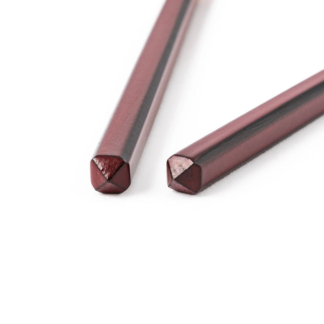 Fine tip Japanese bamboo chopsticks featuring a wine red handle with dark side stripes and a natural bamboo finish
