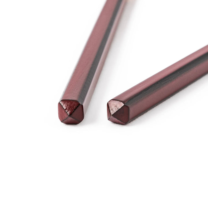 Fine tip Japanese bamboo chopsticks featuring a wine red handle with dark side stripes and a natural bamboo finish
