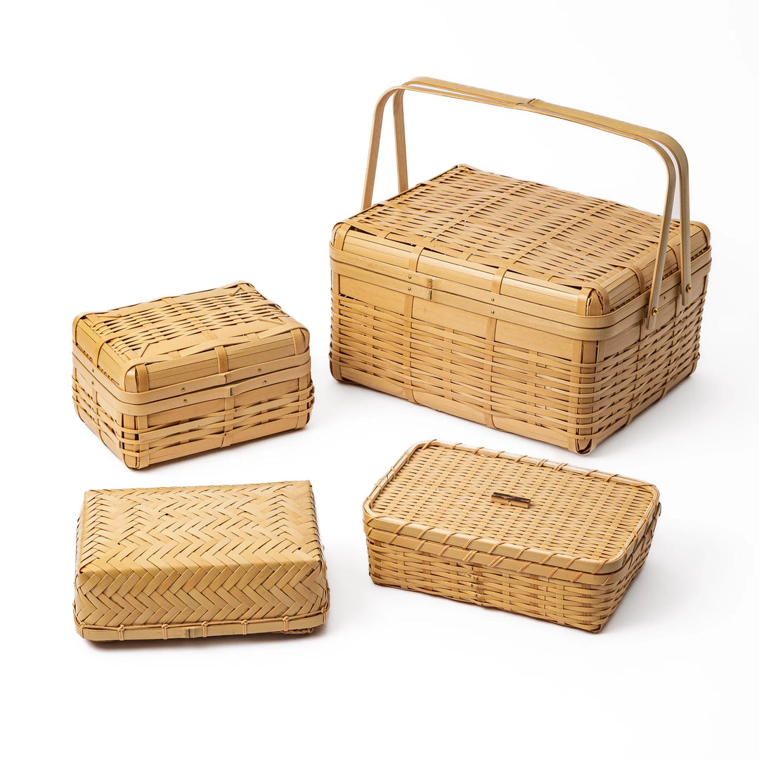 Collection of Japanese bamboo bento boxes in Ajiro Hishigi and Goza weave patterns for traditional picnic lunch sets