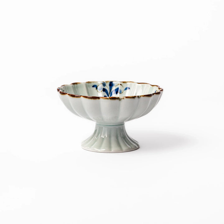 Arita porcelain pedestal bowl with blue arabesque pattern and gold rim, perfect for serving desserts, fruits, or side dishes.