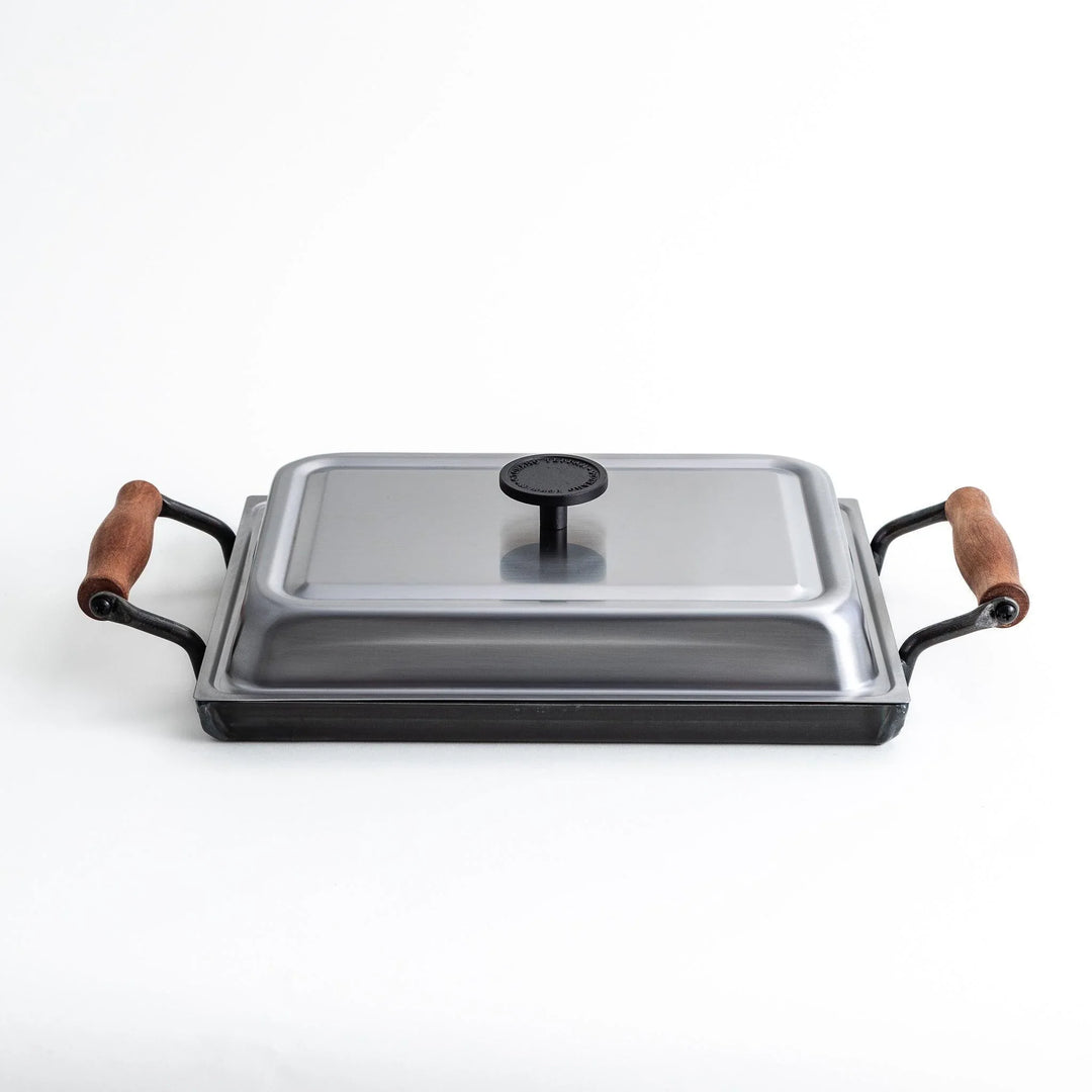 Rectangular teppanyaki grill pan with wooden handles on both sides with stainless steel lids