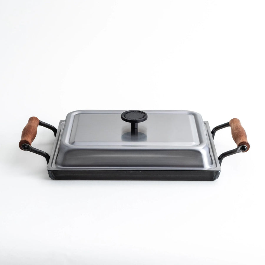 Rectangular teppanyaki grill pan with wooden handles on both sides with stainless steel lids