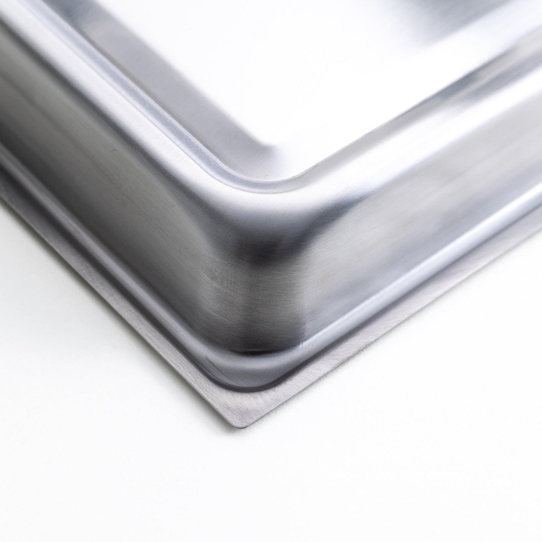 Rectangular teppanyaki grill pan with wooden handles on both sides with stainless steel lids