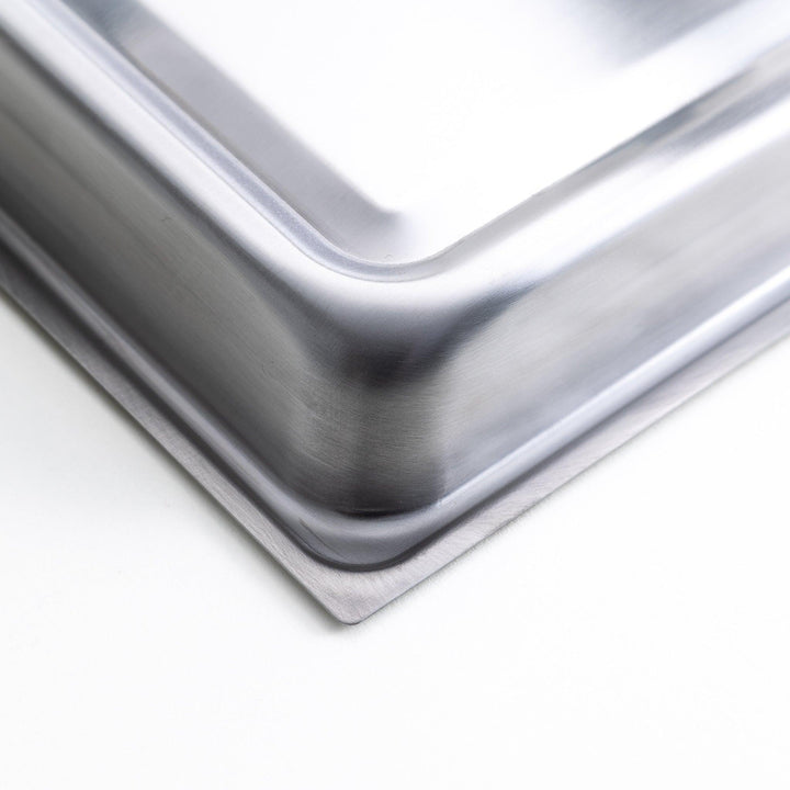 Rectangular teppanyaki grill pan with wooden handles on both sides with stainless steel lids