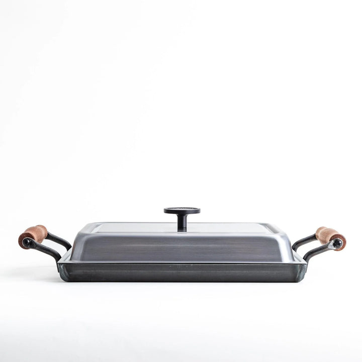 Rectangular teppanyaki grill pan with wooden handles on both sides with stainless steel lids