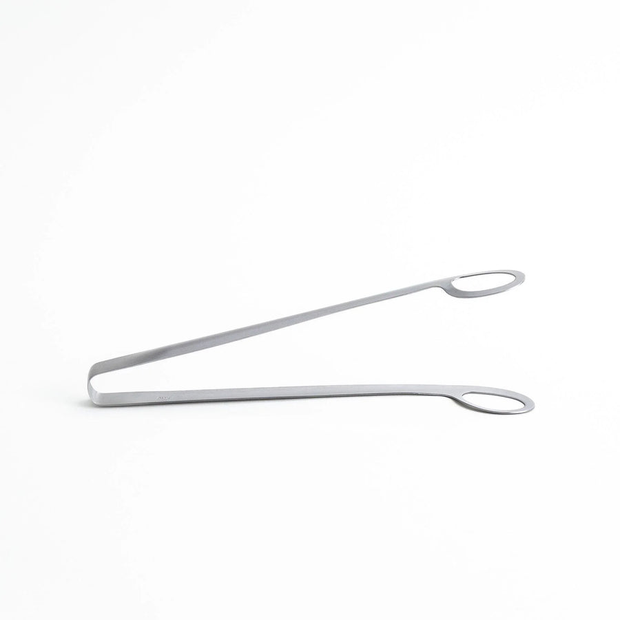 Curved stainless steel tongs with holes at the end for drainage