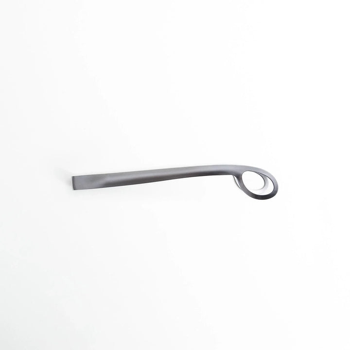 Curved stainless steel tongs with holes at the end for drainage