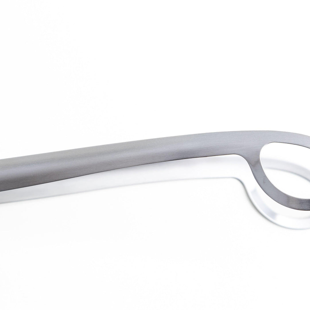 Curved stainless steel tongs with holes at the end for drainage