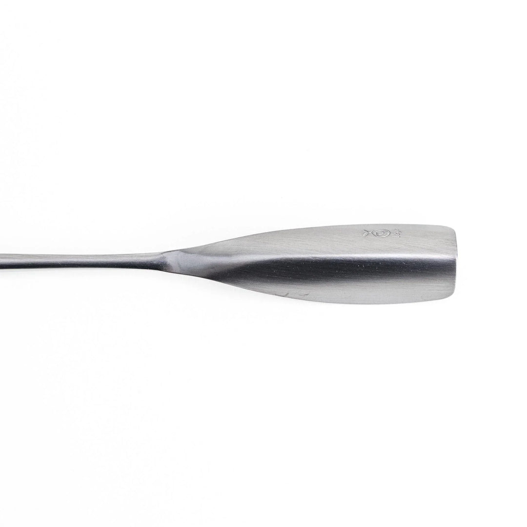 Long-handled stainless steel honey spoon with a uniquely shaped flat scoop