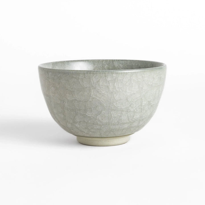 Azure clay matcha bowl with a smooth cracked texture, offering a calming, elegant design for an enjoyable tea experience.