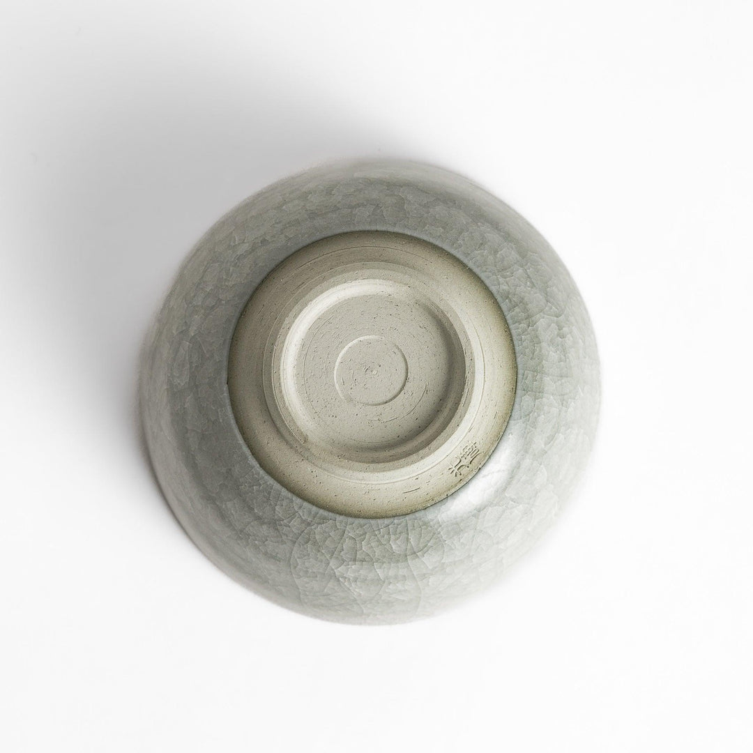 Azure clay matcha bowl with a smooth cracked texture, offering a calming, elegant design for an enjoyable tea experience.